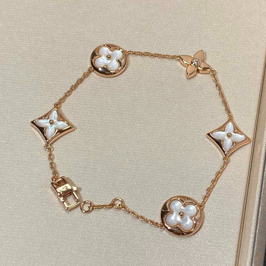 [Luxery]STAR AND SUN 5 MOTIF MOP PINK GOLD BRACELET