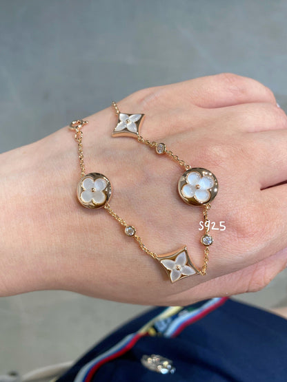 [Luxery]STAR AND SUN 4 MOTIF WHITE MOP PINK GOLD BRACELET