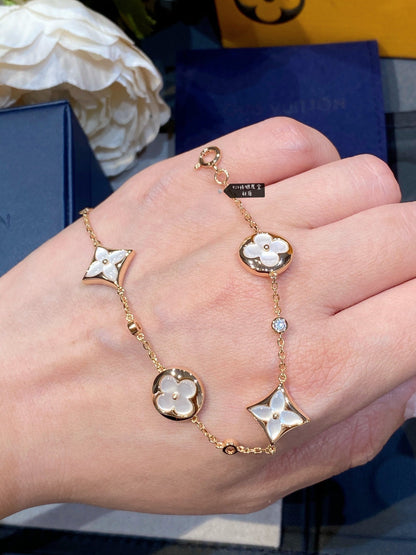[Luxery]STAR AND SUN 4 MOTIF WHITE MOP PINK GOLD BRACELET